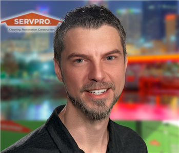 Male employee, Matt Clegg, with SERVPRO® background
